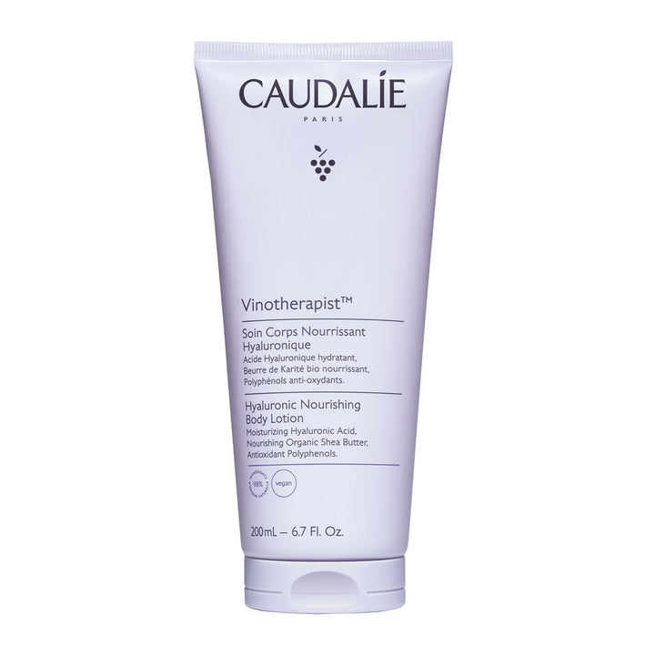 Caudalie Light purple plastic tube with flip-top cap, printed text, grape icon and measurement label