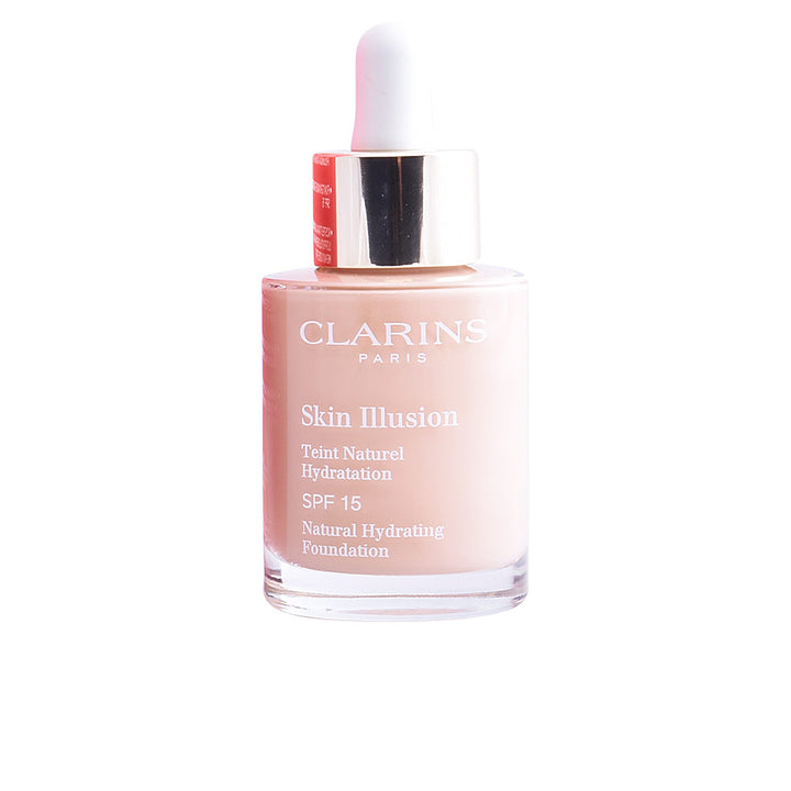 Frasco del tono 113 en presentación de 30 ml del maquillaje Skin Illusion Teint Naturel Hydratation de Clarins; se aprecia el envase translúcido con dosificador y etiqueta clara que indica el número de tono 113 y el volumen 30 ml.