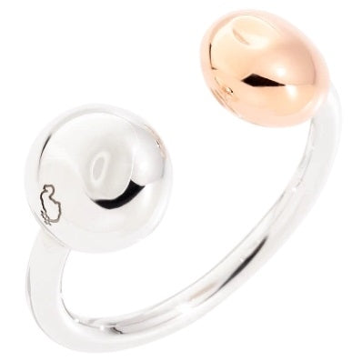 Open dual-tone ring in silver and rose gold showing contrasting polished finishes on finger