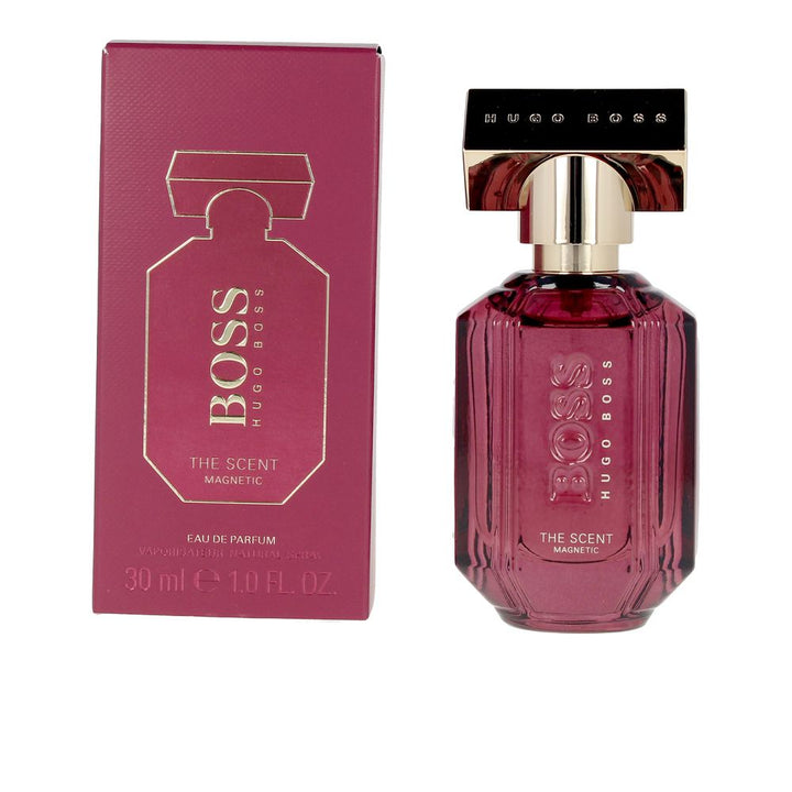 Faceted purple 50 ml perfume bottle with frosted gold cap, amber-musk fragrance